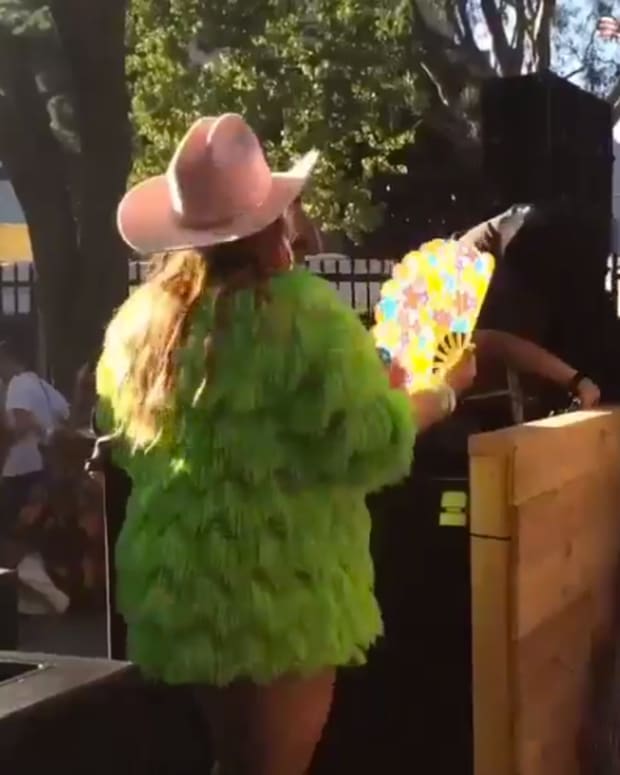fan rushes stage at fyf fest