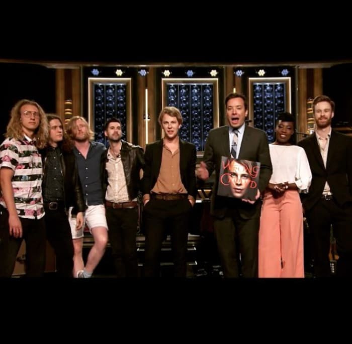 Dylan Meek performing with British singer-songwriter Tom Odell on The Tonight Show Starring Jimmy Fallon in 2016. Meek has performed on Late Night with Seth Meyers with Post Malone and The Late Late Show With James Corden supporting Grace VanderWaal.